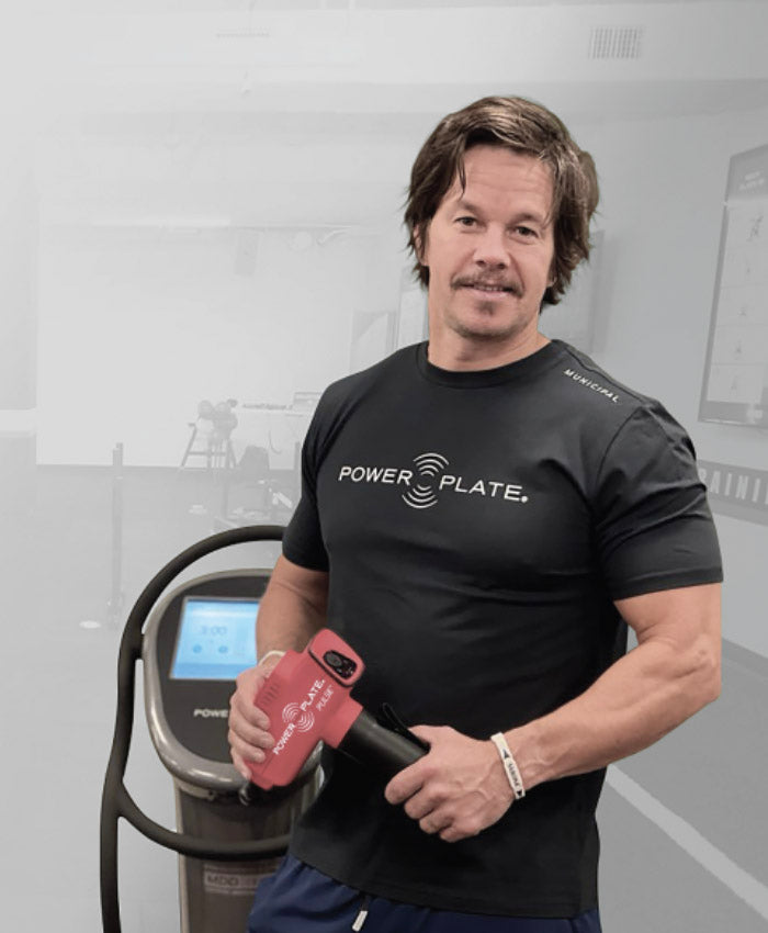 Mark Wahlberg with a Power Plate training platform