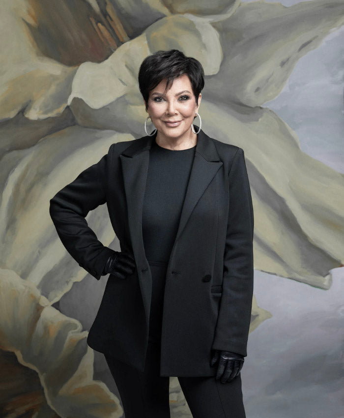 Kris Jenner with a Power Plate training platform